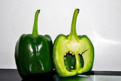 Close-up of green bell peppers on table