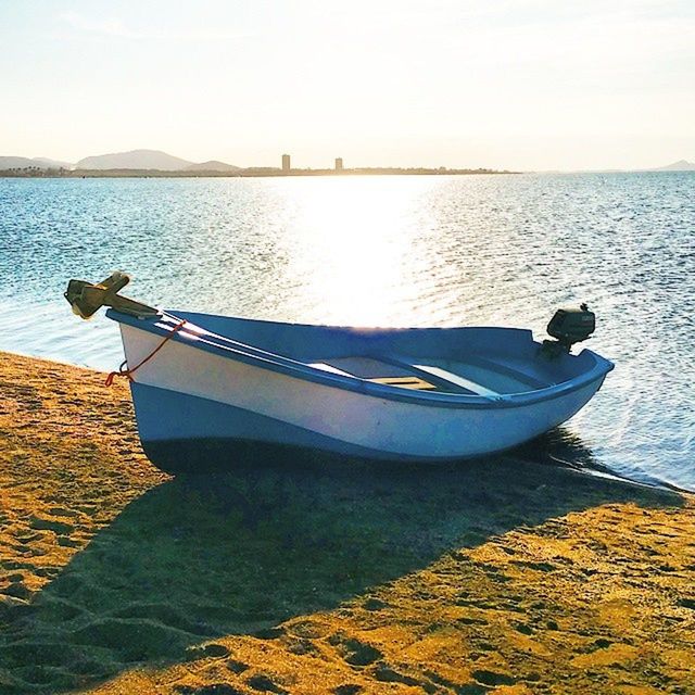 nautical vessel, transportation, water, boat, mode of transport, sea, moored, tranquil scene, tranquility, travel, scenics, clear sky, nature, rippled, sky, beauty in nature, sailing, outdoors, day, sunlight