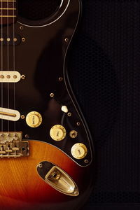 High angle view of guitar on table