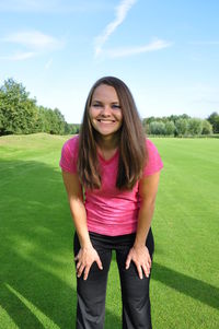 Portrait of beautiful woman standing in park