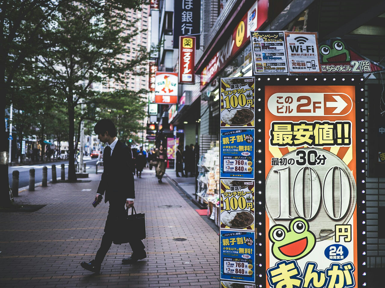 city, street, city life, building exterior, outdoors, city street, rear view, adults only, one person, road, people, one man only, day, architecture, only men, adult