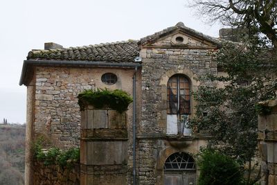 Low angle view of old building against sky