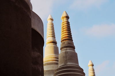 Low angle view of temple against building