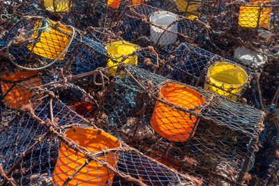 High angle view of fishermen nets stocked in harbour docks