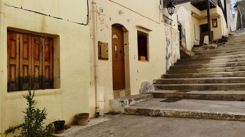 Alley amidst buildings in city