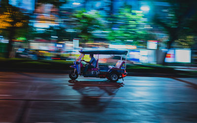 View of motorcycle on street in city