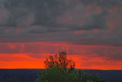 Scenic view of dramatic sky during sunset