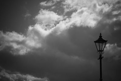 Low angle view of street light against sky