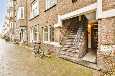 Rear view of man riding bicycle