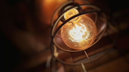 Close-up of illuminated light bulb