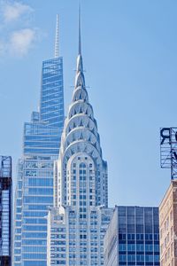 Low angle view of skyscrapers against clear sky