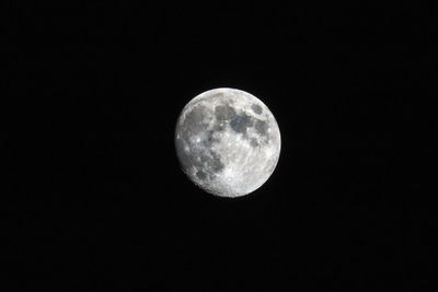 Low angle view of moon against sky at night