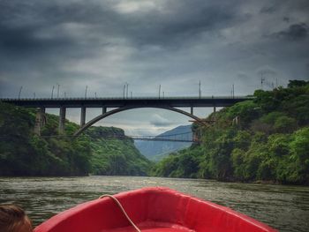 Bridge over river against sky