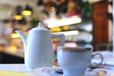 Close-up of coffee cup on table