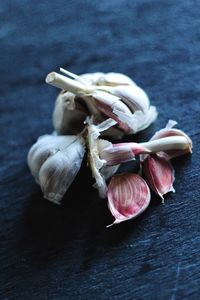 Close-up of garlic on table