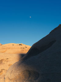 Scenic view of desert against clear blue sky, wadi rum, jordan