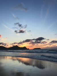 Scenic view of sea against sky during sunset