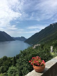 Scenic view of sea with mountains in background