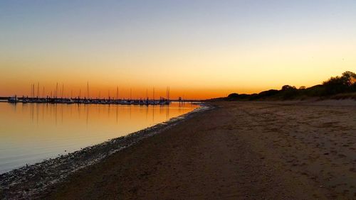 View of beach at sunset