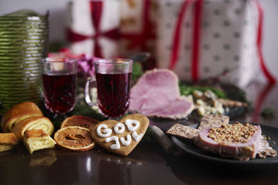 Christmas food and presents on table