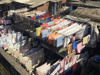 Clothes hanging in store for sale in market