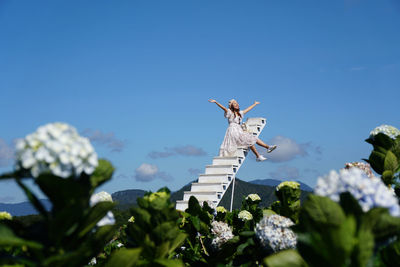 Low angle view of statue against clear blue sky