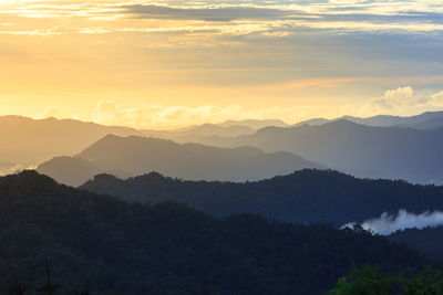 Scenic view of mountains against sky during sunset