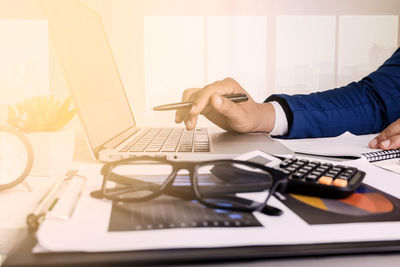 Man using laptop on table