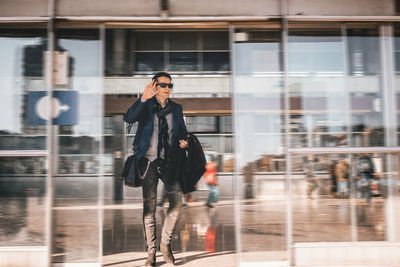 Full length of man walking at airport