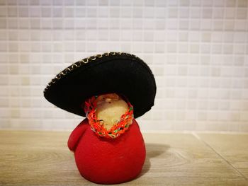 Close-up of hat on table