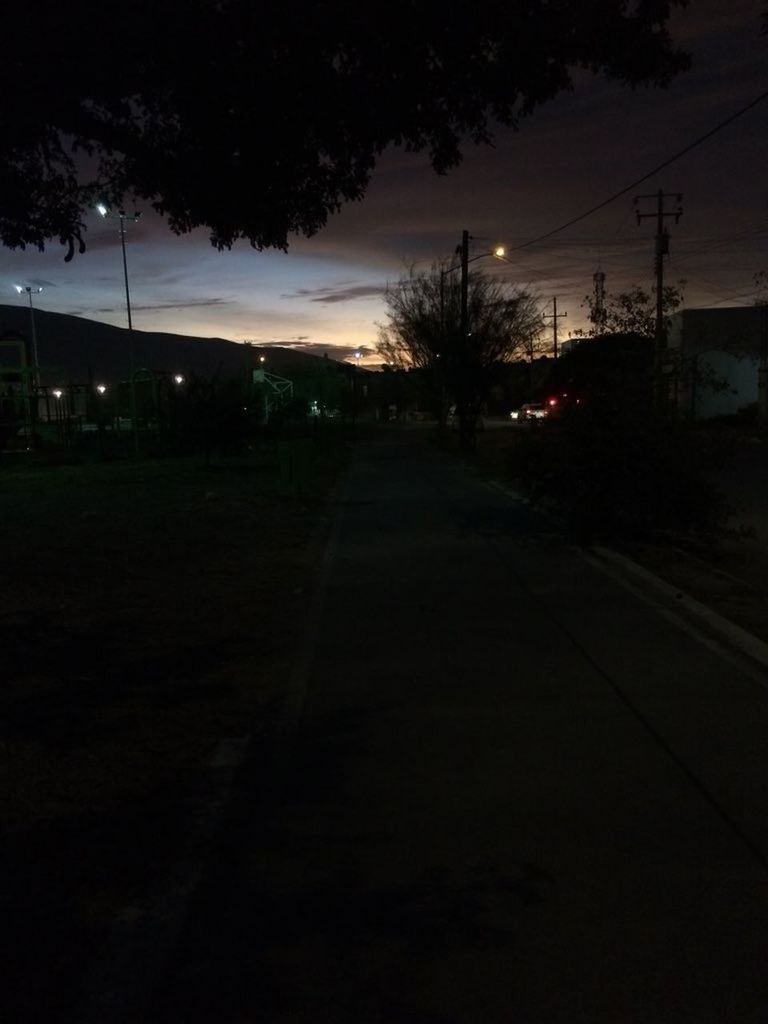 tree, night, sky, cable, silhouette, cloud - sky, electricity pylon, illuminated, electricity, outdoors, no people, street light, nature, road, built structure, building exterior, city