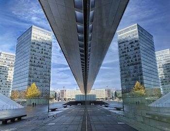 Modern buildings in city against sky