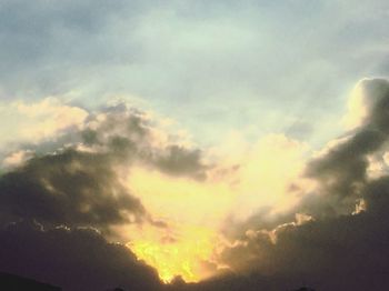 Low angle view of clouds in sky during sunset