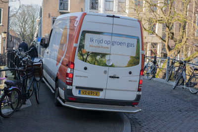 Bicycle parked on street in city