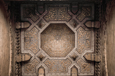 Directly below shot of ceiling of building