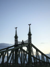 Low angle view of bridge against clear sky