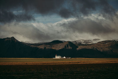 Scenic view of field against sky during sunset