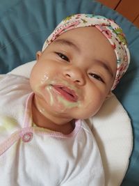 Close-up portrait of cute baby girl