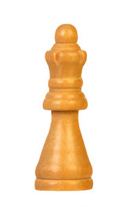 Close-up of chess pieces against white background