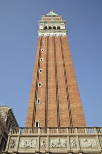 Low angle view of built structure against clear blue sky