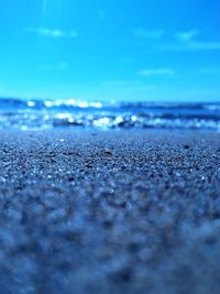 Surface level of beach against sky