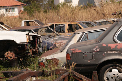 Abandoned car on land