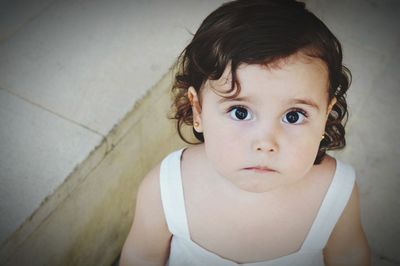 High angle portrait of cute girl looking away