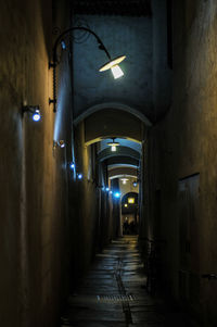 Empty narrow corridor along the walls