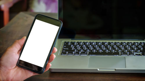 Low angle view of mobile phone on table