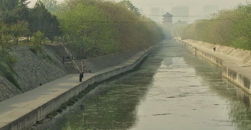 View of canal along buildings
