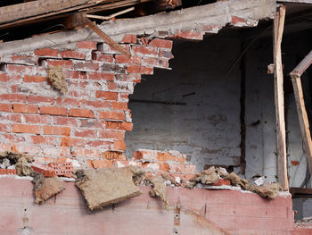 Damaged brick wall