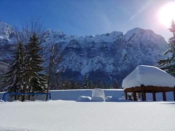 Snow covered mountain against sky