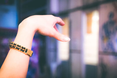 Cropped hand of woman wearing bracelet