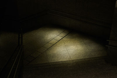 High angle view of illuminated staircase in building